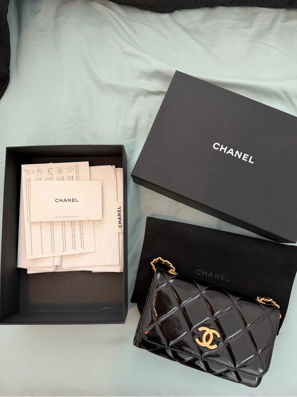 CHANEL Black Quilted Patent Leather Mini Flap with Gold Hardware